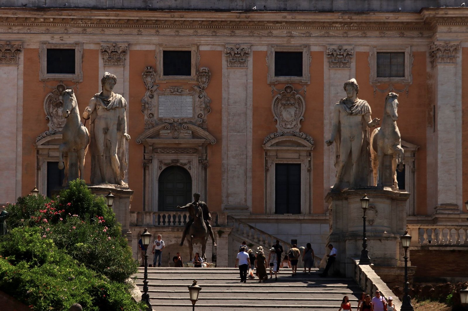 Stone statues and historic buildings on Capitoline Hill in Rome, with the Capitoline Geese legend referenced nearby
