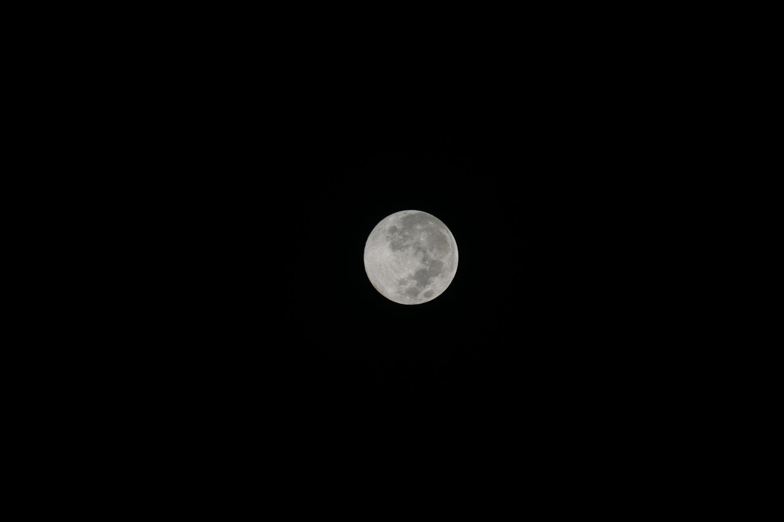 Bright full moon glowing in a clear night sky, symbolizing Selene watching over Endymion.