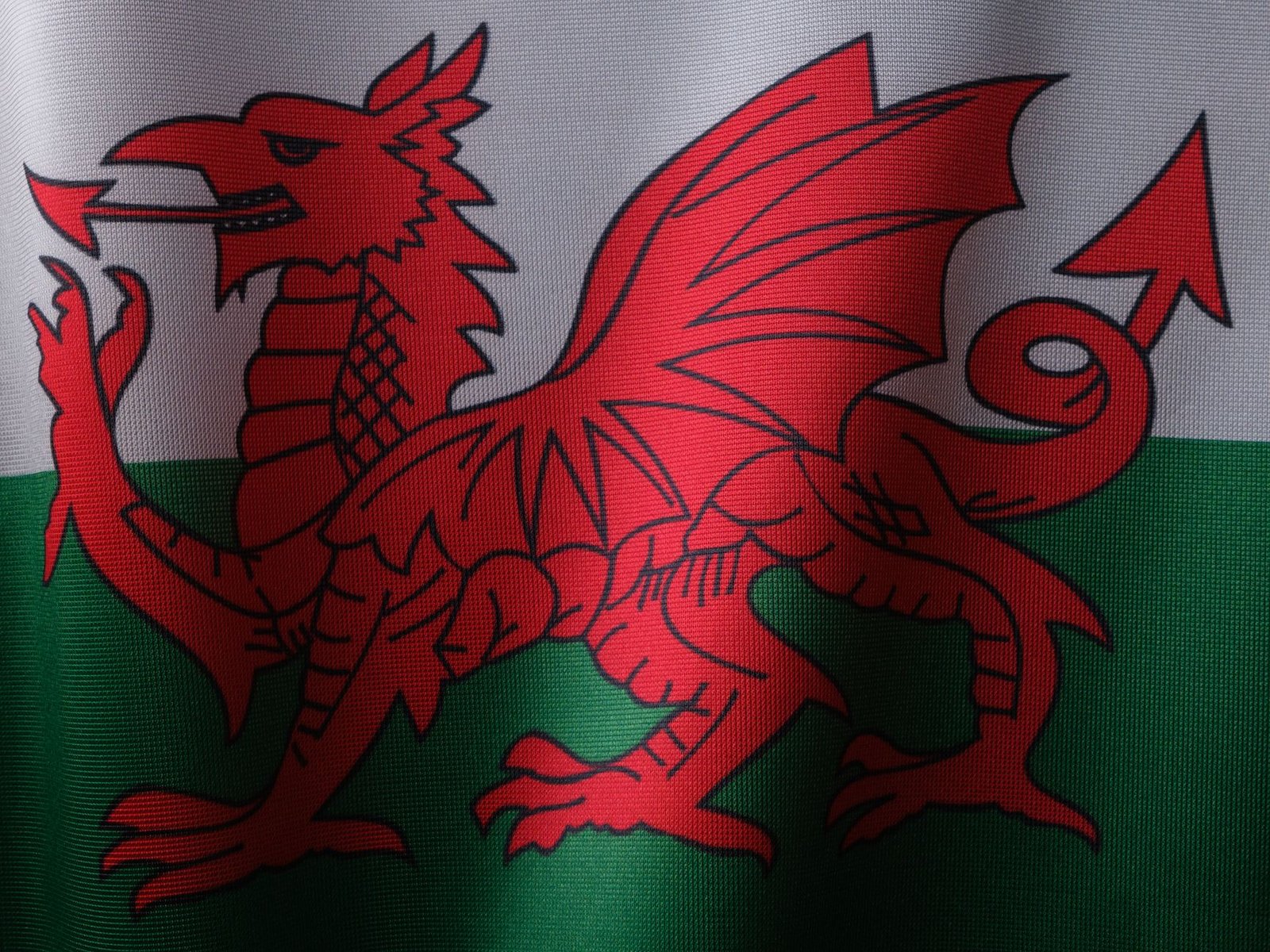 Red Welsh dragon on the flag of Wales, symbolizing Welsh mythology and the legend of Lleu Llaw Gyffes