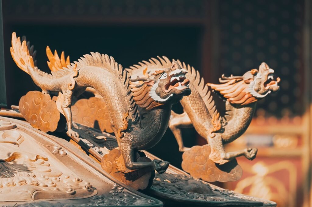 Intricate wooden sculpture of Ryujin, a mythical dragon with detailed carvings and flowing scales