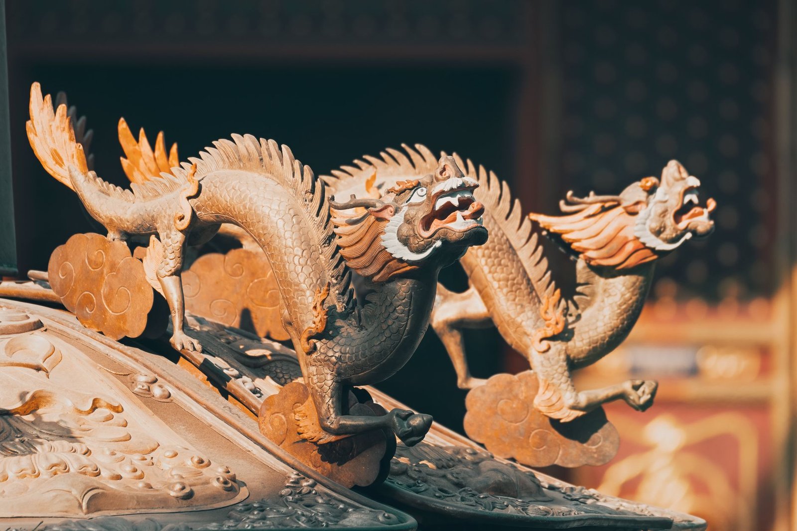 Intricate wooden sculpture of Ryujin, a mythical dragon with detailed carvings and flowing scales