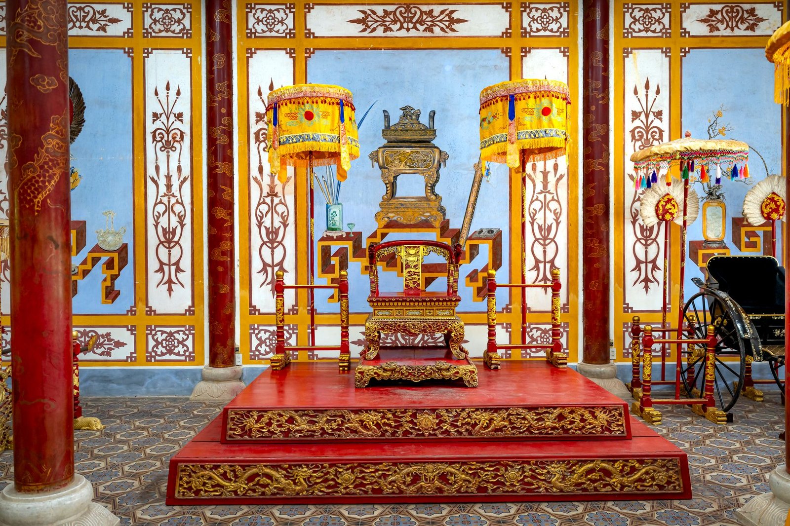 Ornate Japanese throne room with gold and red decorations, symbolizing the Three Imperial Regalia of imperial authority