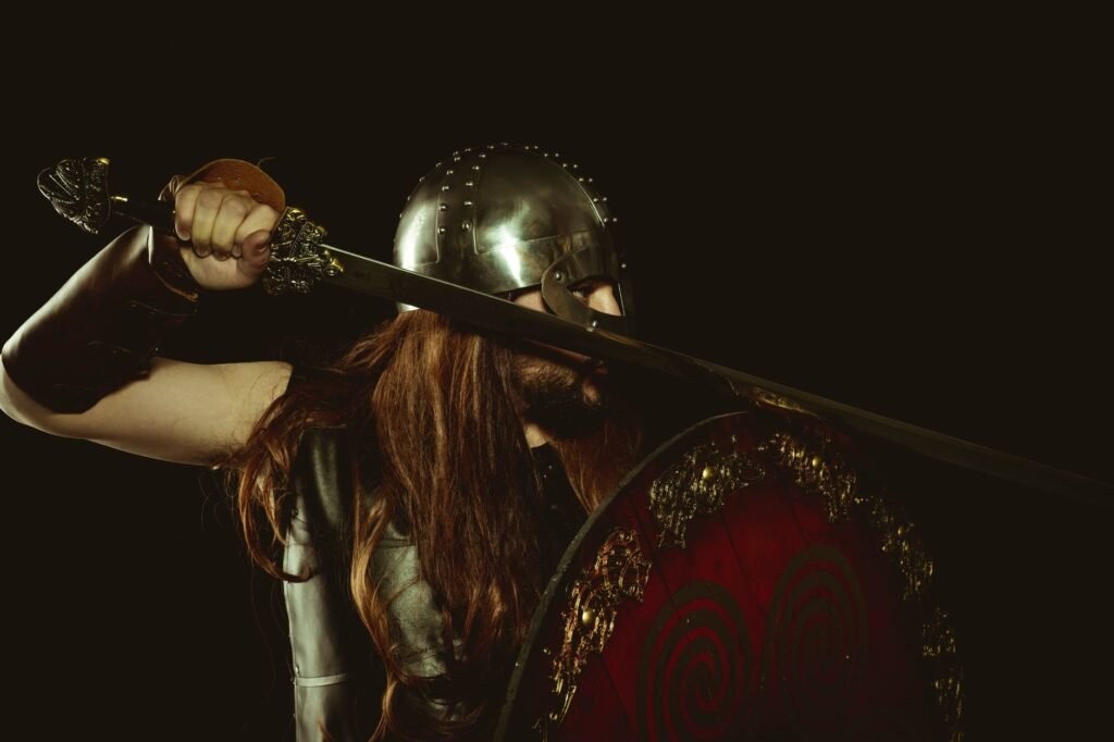 Medieval warrior with sword and shield, evoking the Aegishjalmur or helm of awe symbol of protection