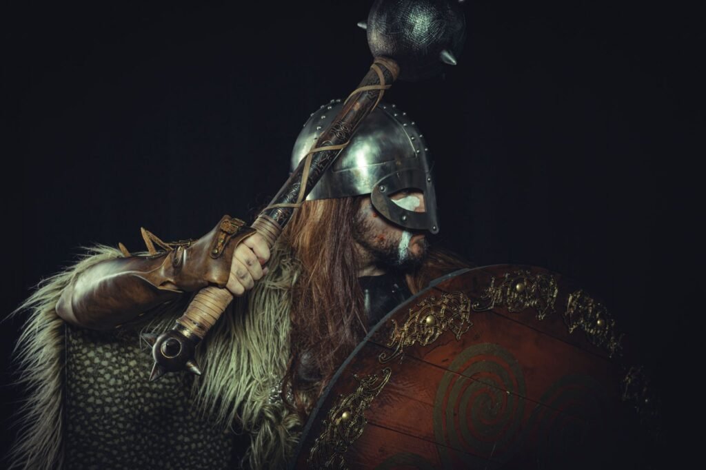 Medieval Viking warrior in armor with mace and shield, symbolizing the Norse creation myth