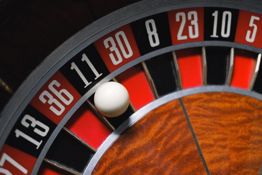 Close-up of a roulette wheel with the ball landing on number 30