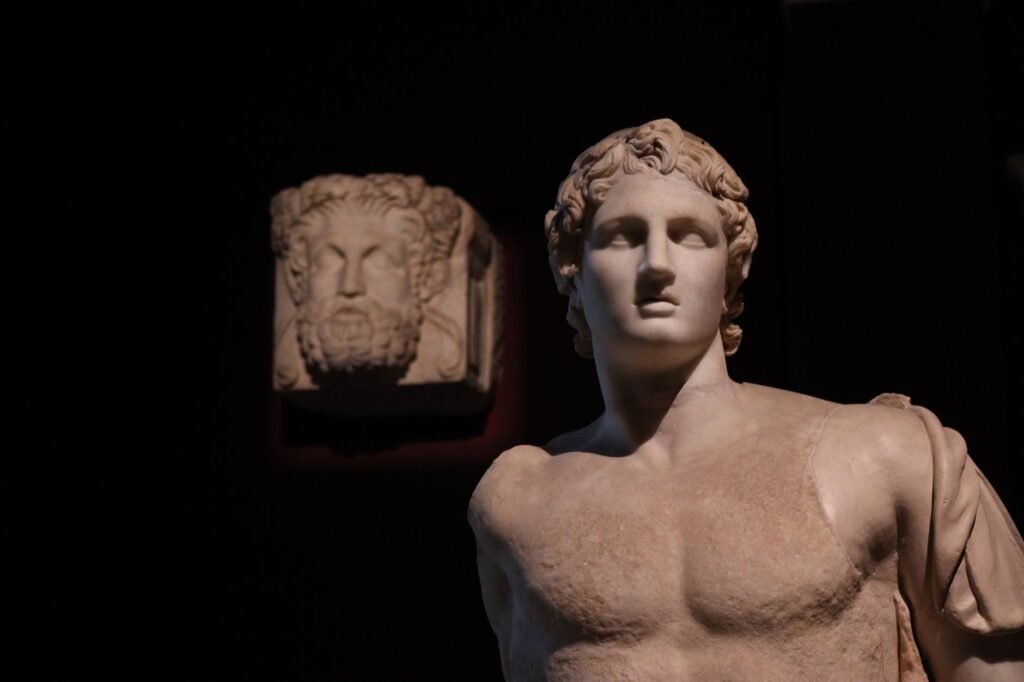 Ancient Greek marble statues evoking Helios in Greek mythology and classical solar god artistry